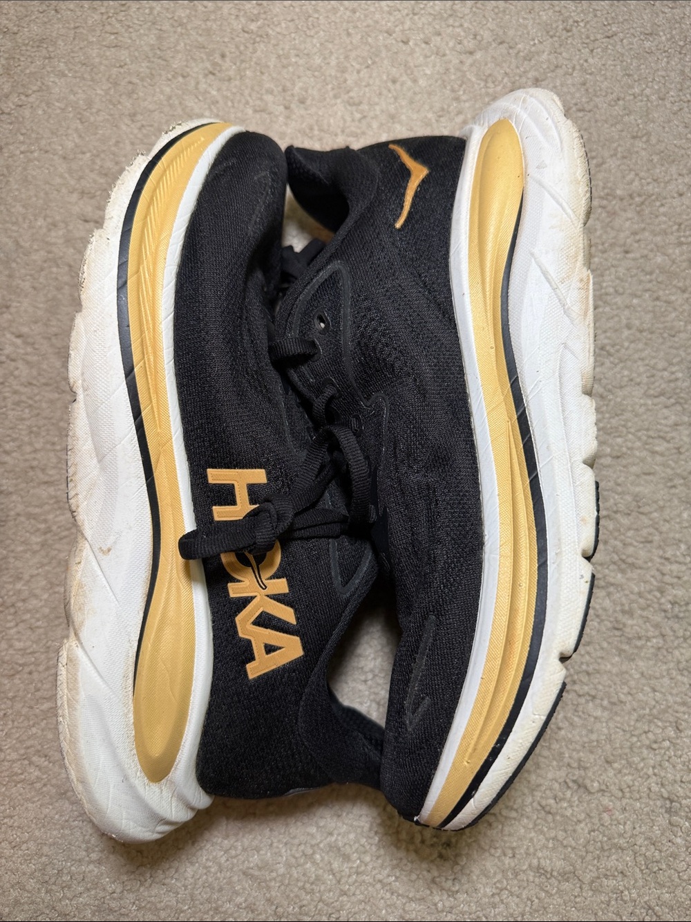 Hoka Black and Gold Women's Athletic Running Shoes - Picture 13 of 13